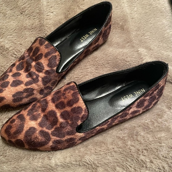 Cute leopard flats. Worn twice. Comes w/box - Picture 2 of 2